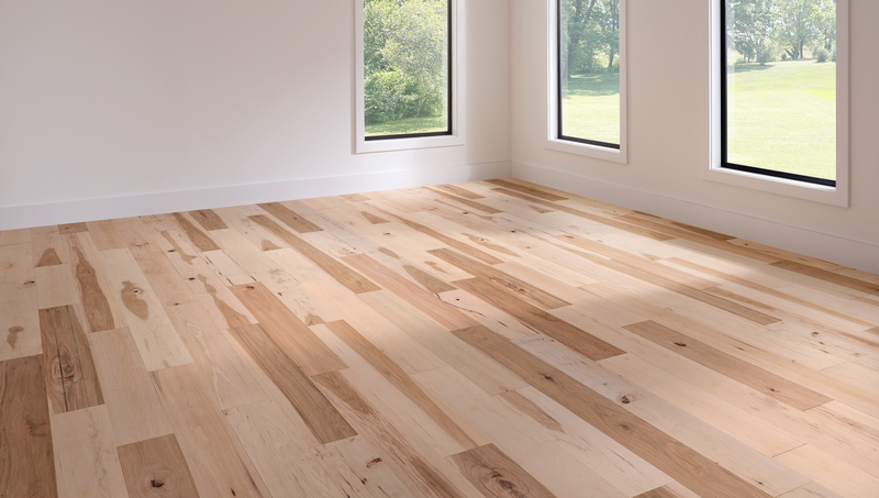 Unfinished wood floor in a room ready for sanding and staining